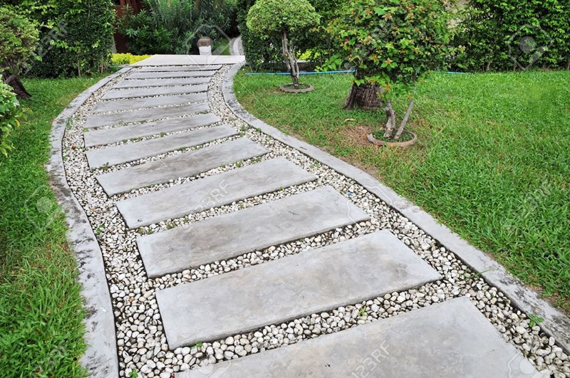 14912136-stone-walkway-on-a-grassy-in-the-garden